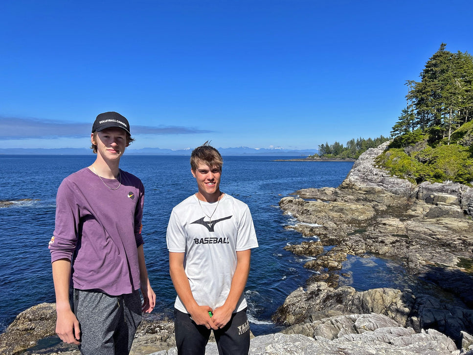 two teens all smiles at otter lookout malei island