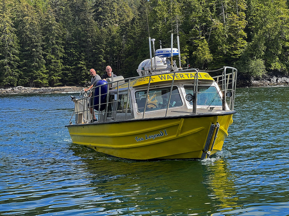 cape scott yellow water taxi coming into malei island resort